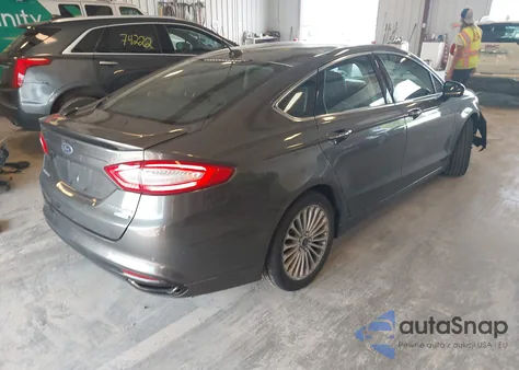 2016 Ford Fusion Titanium z USA, uszkodzony, nr VIN 3FA6P0K98GR135874